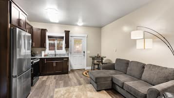 Apartment | Living area | 57-inch Smart TV with digital channels, Netflix, Hulu