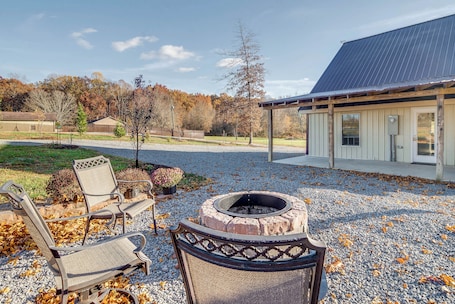Terrace/patio. Peaceful Russell Springs Home w/ Fire Pit & Pond!