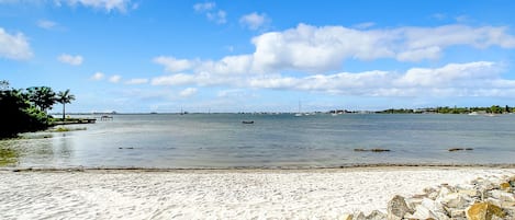 On the beach, sun-loungers