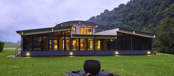 Eco-luxury nestled in off-grid private paradise. Cradled by virgin river!