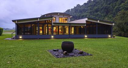 Eco-luxury nestled in off-grid private paradise. Cradled by virgin river!