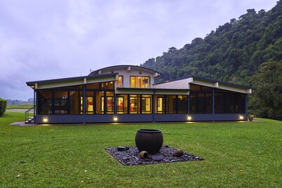 Eco-luxury nestled in off-grid private paradise. Cradled by virgin river!