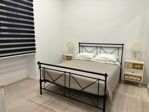 2 bedrooms, desk, iron/ironing board, travel cot