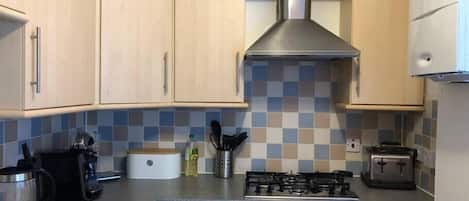 Fridge, microwave, oven, cookware/dishes/utensils