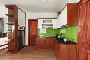 Fridge, microwave, electric kettle, cookware/dishes/utensils