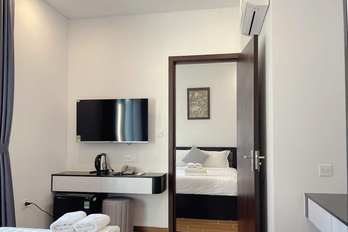 Premium bedding, pillow-top beds, minibar, desk