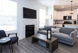 TV connectée, cheminée, espaces bureaux, imprimantes