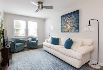 We can't wait for you to enjoy family in our bright and beautiful living area!!