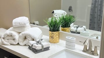Hair dryer, towels, soap, shampoo