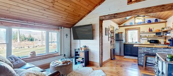 Renovated historic cabin with mountain views, lake access, & electric fireplace