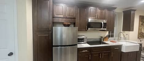 Fridge, microwave, dishwasher, coffee/tea maker