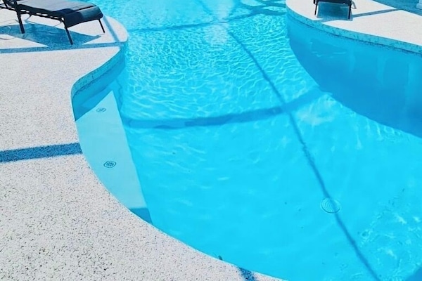 Heated pool with new cage