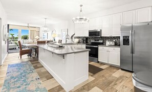 Fridge, microwave, oven, stovetop - The richly appointed and spacious interior of this beautiful condominium! (Destin)