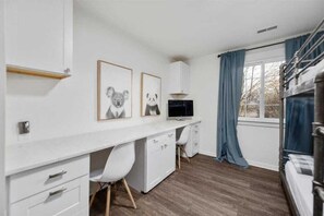 8 bedrooms, desk, iron/ironing board, travel cot