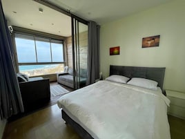 Panoramic Apartment | Desk, blackout drapes, soundproofing, iron/ironing board