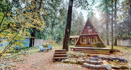 Dog-friendly A-frame near the river with game room, firepit, wood stove, & grill
