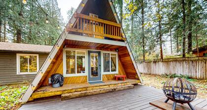 Dog-friendly A-frame near the river with game room, firepit, wood stove, & grill