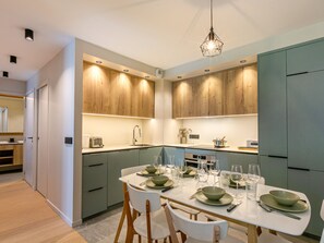 Dining - Cozy Retreat with WiFi, Garage, and Ski-In/Ski-Out Access in a New Upscale Residence (Val-d'Isère)