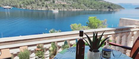 Apartamento conforto, sacada, vista para o mar | Sacada