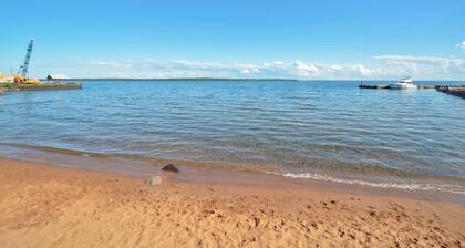 Classic Beach Front Condo with Lake Views