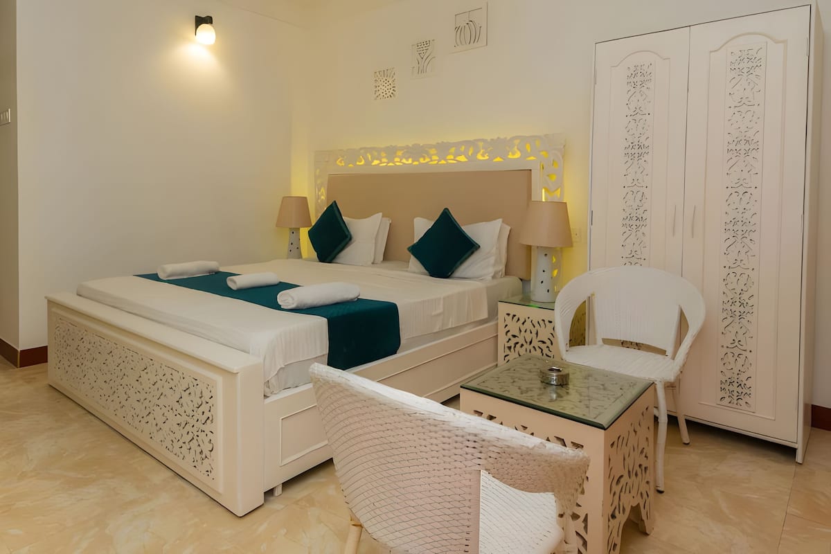 Deluxe tweepersoonskamer | Luxe beddengoed, een bureau, gratis wifi, beddengoed