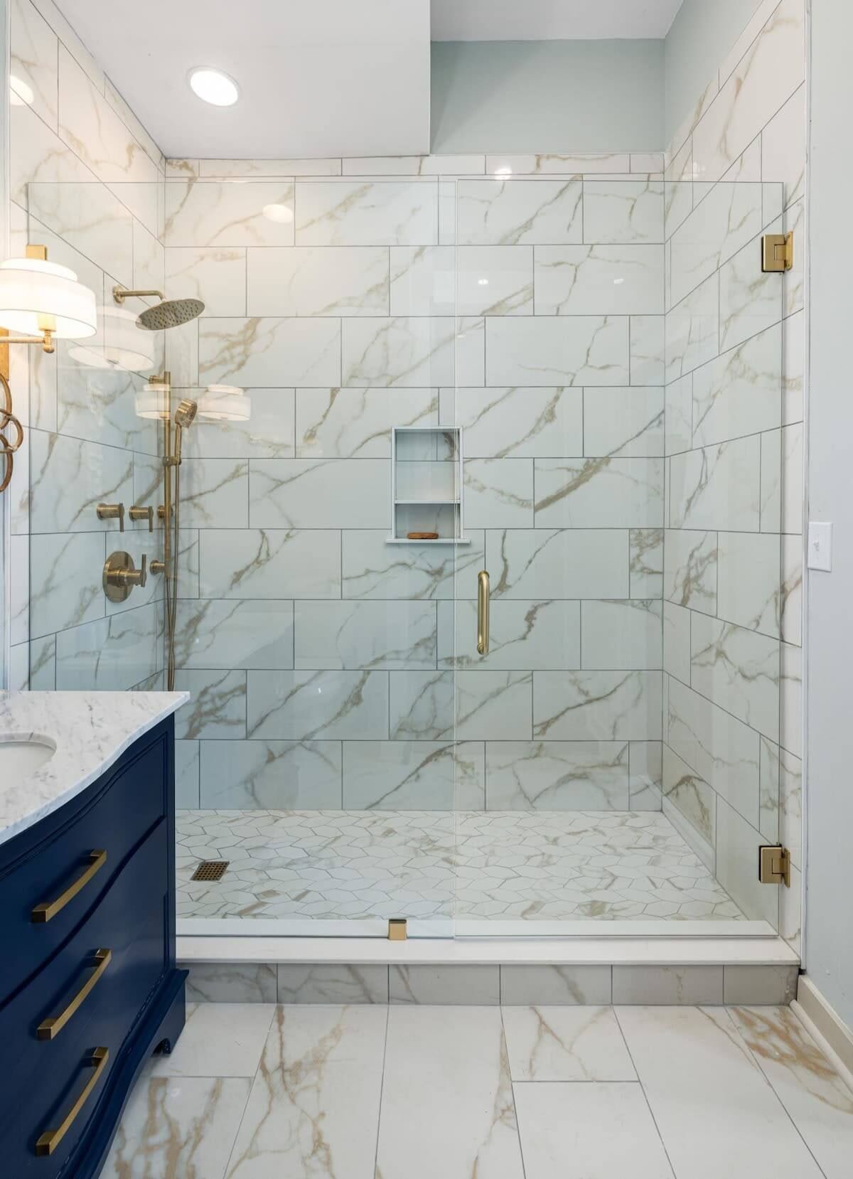 Shower, hair dryer, towels, shampoo