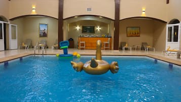 Indoor pool, outdoor pool, pool umbrellas, sun loungers