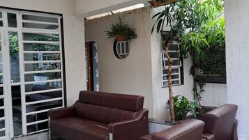 Family Bungalow | Living area | 24-inch Smart TV with digital channels