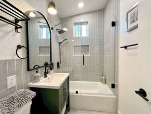 Shower, hair dryer, towels