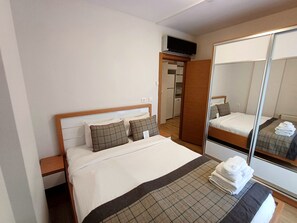 Habitación junior, 1 cama matrimonial | Minibar, insonorización, wifi gratis y ropa de cama 