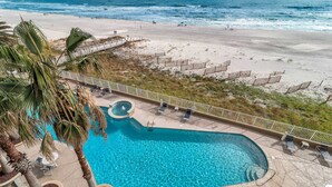 A swimming pool with a view of the beach and ocean. - Admirals Quarters 1403-Beachfront | 2 King Suites | Free parking for 2 Vehicles (Orange Beach)