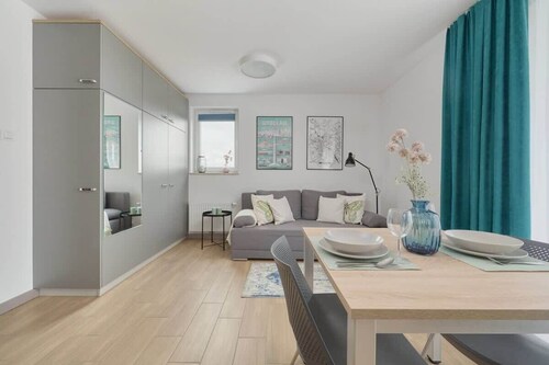 Functional Studio in Wroclaw | Balcony and Workspace