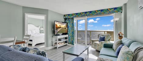 Signature Condo, 3 Bedrooms, Balcony, Ocean View | Living room | 65-inch Smart TV with cable channels
