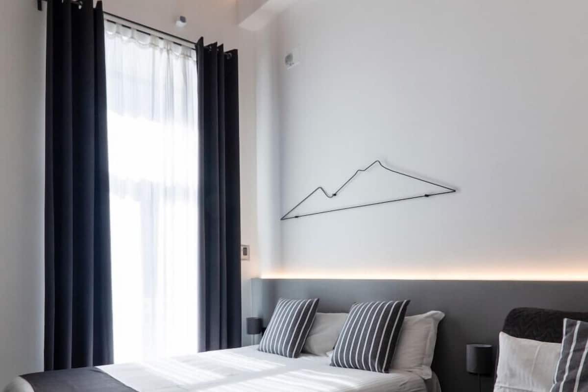 Luxury Suite, 1 Queen Bed, Non Smoking, Balcony | 1 bedroom, premium bedding, down comforters, memory foam beds