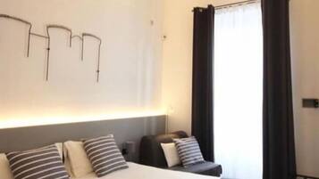 Suite Deluxe, 1 letto queen, non fumatori, vista città | 1 camera, biancheria da letto di alta qualità, copriletto in piuma