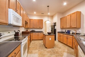 House, 4 Bedrooms | Private kitchen - Private Oasis With Pool & Spa- 3400clr 4 Bedroom Home by RedAwning (Kissimmee)