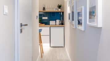 Departamento Premium | Cocina privada | Refrigerador, microondas, horno y parrilla de estufa