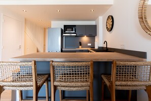 Basic Apartment | Private kitchen | Full-size fridge, microwave, oven, stovetop