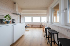 Mini-fridge, stovetop, cookware/dishes/utensils