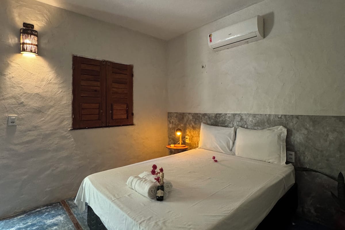 Quarto econômico | 1 quarto, espaço de trabalho para notebook, Wi-Fi de cortesia