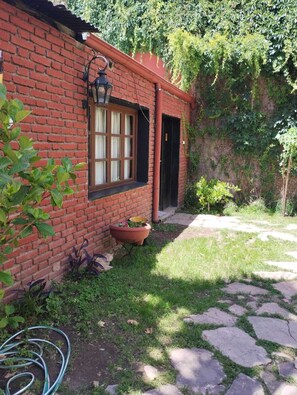 Habitación cuádruple familiar | Terraza o patio