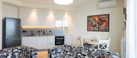 Exclusive Apartment | Private kitchen | Full-size fridge, oven, dishwasher, espresso maker