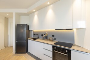 Appartement exclusif | Cuisine privée | Réfrigérateur grande capacité avec congélateur, un four, lave-vaisselle