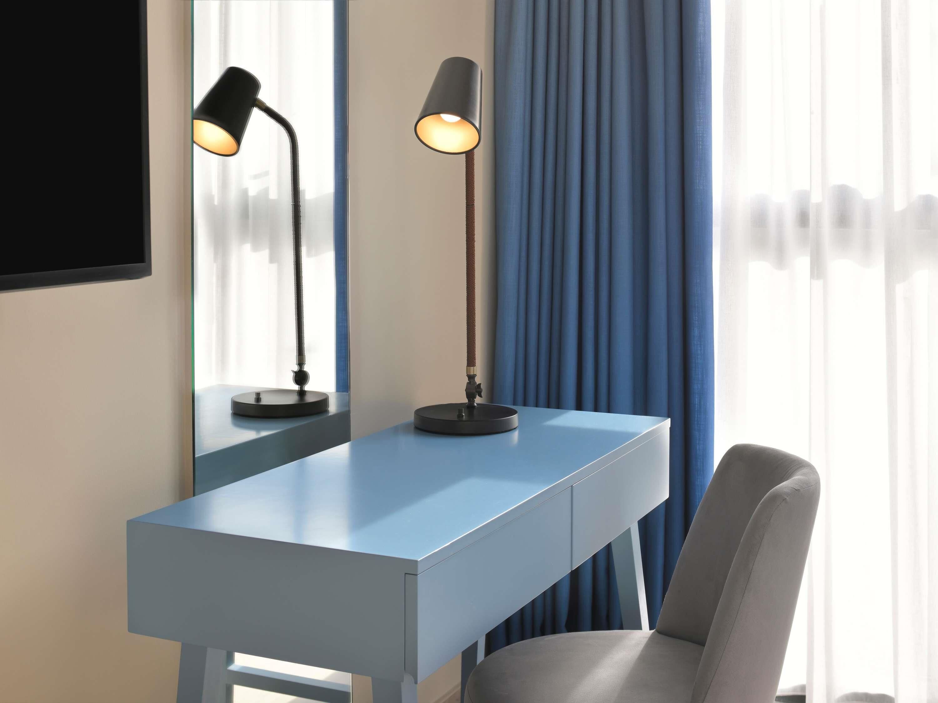 Premium bedding, down comforters, pillowtop beds, minibar