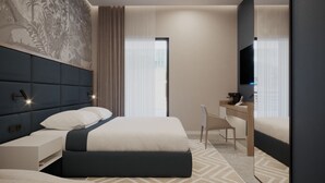 A modern hotel room with a large bed, a desk, a chair, and a television. - Mercure Tirana (Tirana)