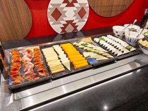 A buffet with various food items including meats, cheeses, and vegetables. - Mercure Tirana (Tirana)