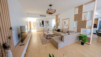 Villa Luxe | Salle de séjour | TV connectée de 42 cm avec chaînes par câble