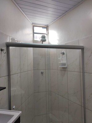 Shower, towels, toilet paper