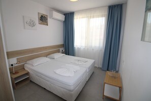 1 habitación y ropa de cama