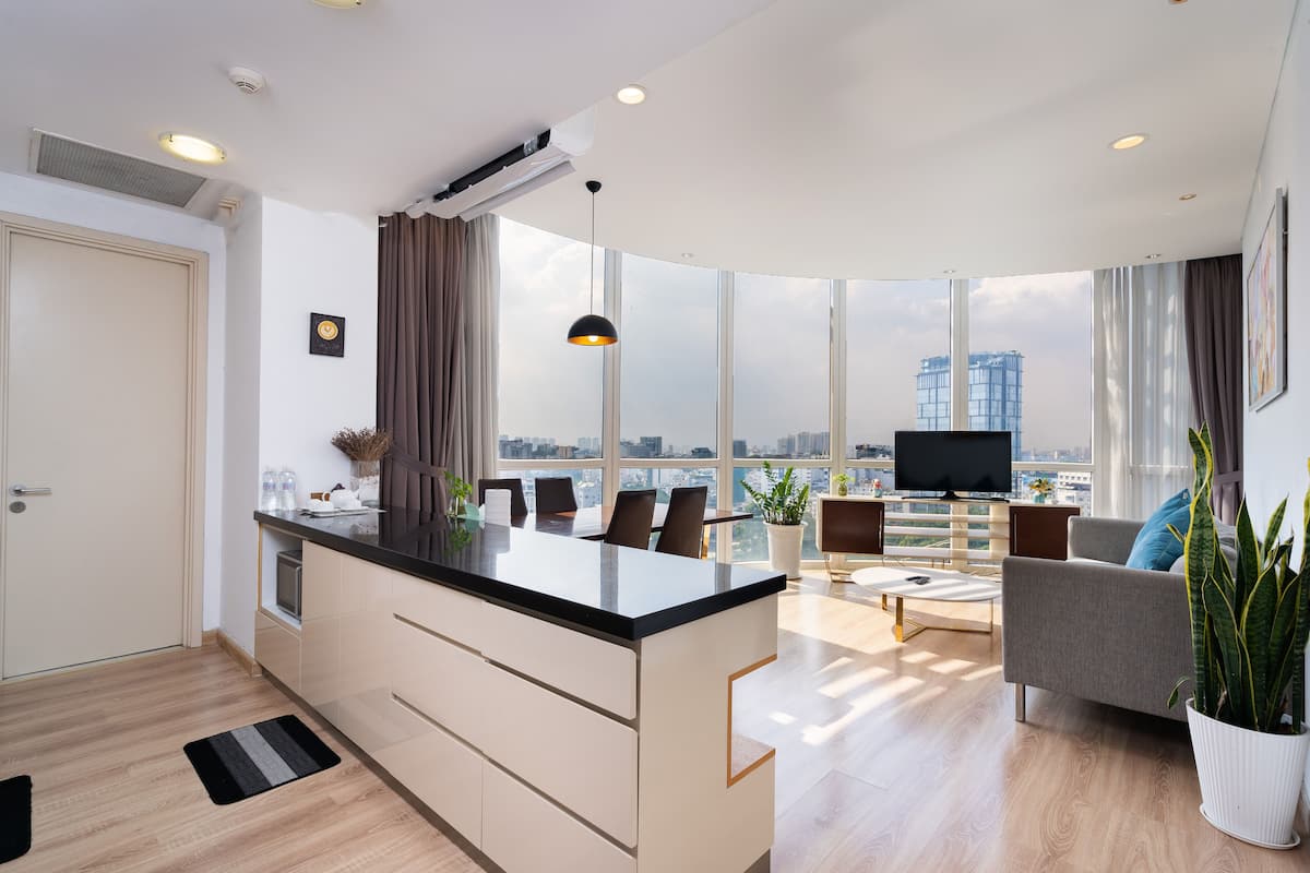 2 BEDROOMS APARTMENT | Living area | 45-inch Smart TV with cable channels, Netflix, pay films